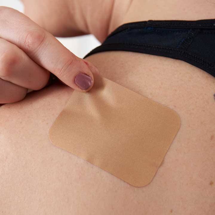 Dermal skin patch on female skin