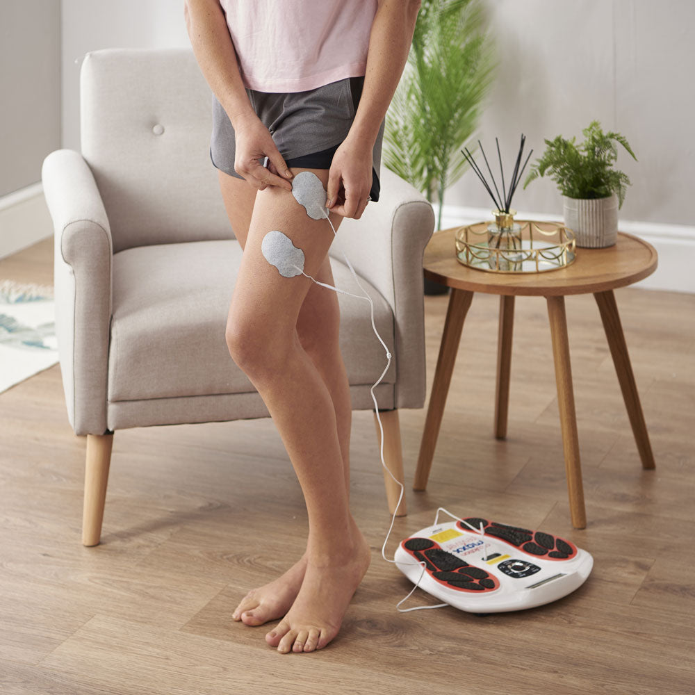 Vytaliving circulation maxx reviver machine using tens pads on leg 